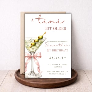 May include: A birthday invitation with a martini illustration. The invitation reads "A tini bit older" and includes details for a 21st birthday celebration, including the date, time, and location. A pink ribbon adorns the martini glass.