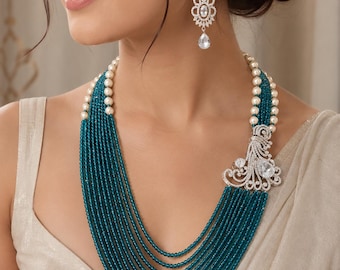 Exquisite Multi-Strand Teal Crystal & Pearl Statement Necklace with Ornate Peacock Motif, Bollywood Style Necklace Set.