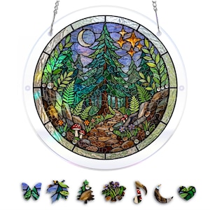 May include: Round stained glass window depicting a forest scene with a path, trees, mushrooms, and a night sky with a moon and stars. The window is framed in a clear border and has a hanging chain. Includes decorative glass shapes.