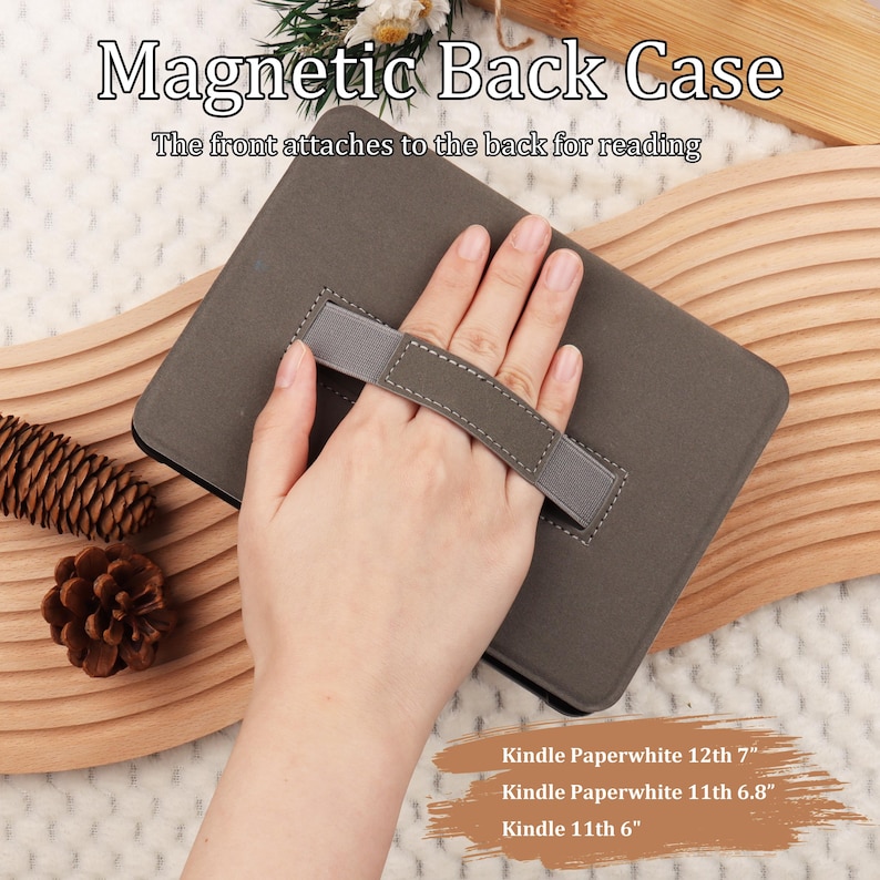 May include: A gray Kindle case with a hand strap. The case has the text "Magnetic Back Case" and "The front attaches to the back for reading". Compatible with Kindle Paperwhite 12th 7", Kindle Paperwhite 11th 6.8", and Kindle 11th 6".