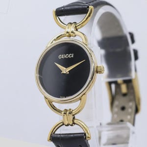 No US Import Fees - GUCCI 6000.2.L Quartz Gold × Black Swiss Made 23mm Women's