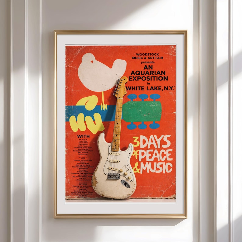 Woodstock poster with electric guitar, listing performers and dates.