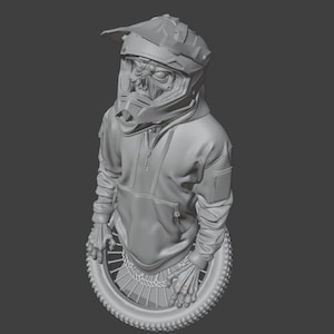 May include: A gray sculpture of a figure wearing a motocross helmet with a skull-like face, a hoodie, and gloves, resting on a tire. The helmet has a visor and the hoodie has a front pocket and a zipper. The figure's hands are resting on the tire.