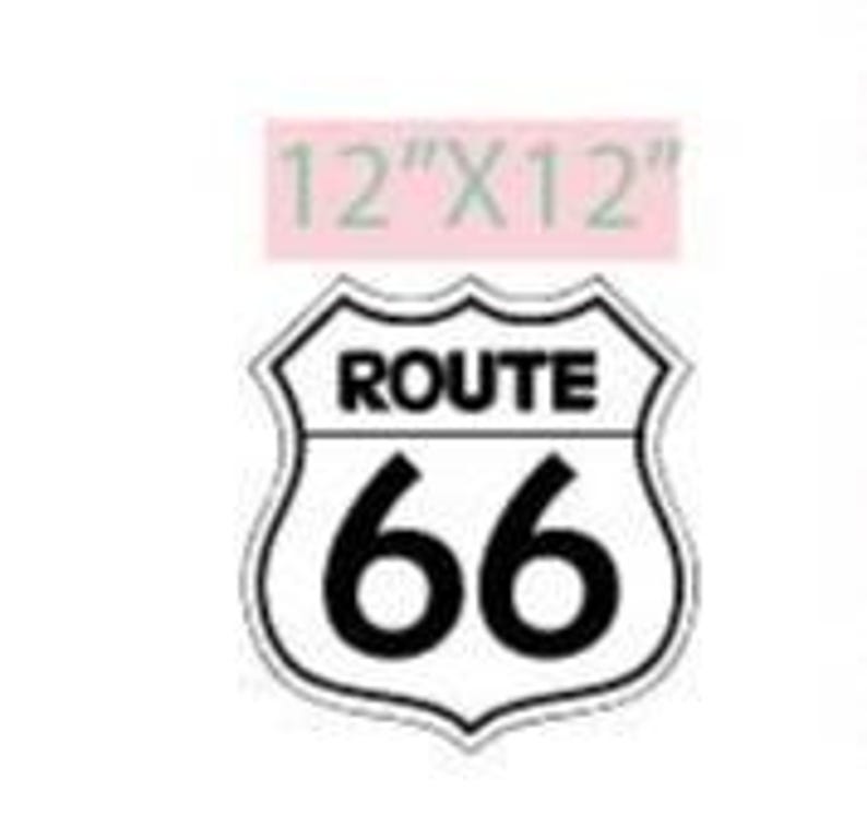 May include: Black and white Route 66 sign with the text "ROUTE 66" and the number "66". The sign is in the shape of a shield and has the dimensions 12" x 12".