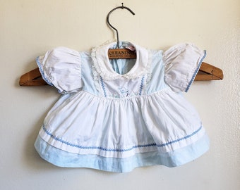 baby girl dress with embroidered blue bird