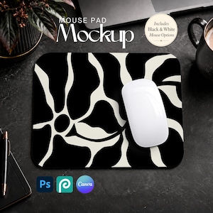 May include: A rectangular mouse pad featuring a high-contrast black and off-white abstract floral pattern. A white computer mouse rests on the surface. The text MOUSE PAD Mockup and Includes Black & White Mouse Options are visible.