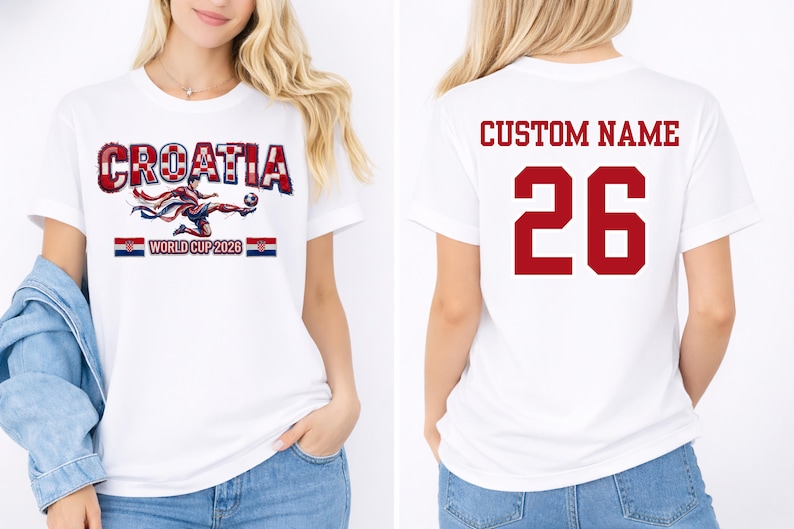 May include: White t-shirt featuring the word "CROATIA" in a red and white checkered design, with a soccer player graphic and the text "WORLD CUP 2026." The back of the shirt displays "CUSTOM NAME" and the number "26" in red.