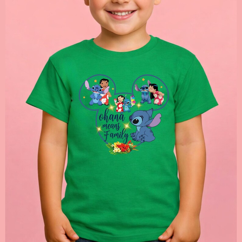 May include: A bright green short-sleeve t-shirt featuring a graphic of Stitch and Lilo inside a Mickey Mouse ear outline. The design includes the text Ohana means Family in a cursive font, surrounded by small yellow stars and tropical flowers.