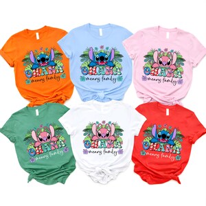 May include: Six short-sleeved t-shirts in orange, light blue, pink, green, white, and red. Each shirt features a graphic of Stitch or Angel surrounded by tropical leaves and flowers, with the text "OHANA means family" in colorful letters.