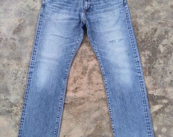 Pantalones vaqueros de mezclilla desgastados de marca japonesa vintage, talla W36x31