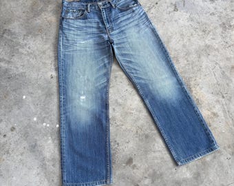 32 x 27,5 vintage Levi's 702 vervaagde denim jeansbroek