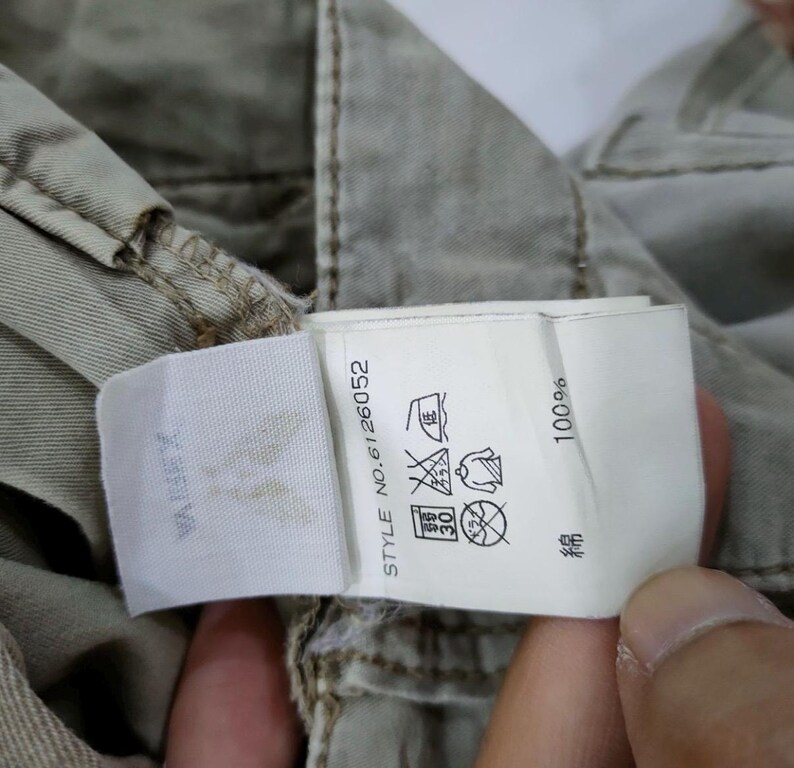 May include: A set of three ceramic mugs with a speckled, matte finish. The mugs are in shades of cream, light gray, and dark gray. Each mug has a simple, minimalist design, perfect for coffee or tea.