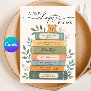 May include: A baby shower invitation card featuring a stack of seven colorful books with a small brown teddy bear on top. The text reads A NEW CHAPTER BEGINS, JOIN US FOR A BABY SHOWER, HONORING THE MOM TO BE, ELSA ROSE, SUN. AUG 12. 4PM, BABY LAND, STREET 205, NY BLOOM 23, RSVP AT ELSA TO 1234 4566 2346, REGISTERED AT BABYCARE.COM/BABY.