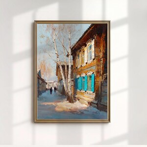 Puede incluir: Pintura al óleo de una escena callejera con un edificio de madera desgastada con contraventanas turquesas y marcos de ventanas blancos. Un árbol desnudo se encuentra frente al edificio, y dos figuras caminan por la calle. La obra de arte está enmarcada en un marco dorado.