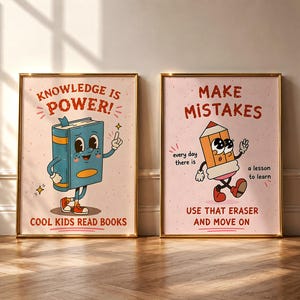 May include: Two framed wall art prints with light pink backgrounds. The left print features a blue book character with the text KNOWLEDGE IS POWER! COOL KIDS READ BOOKS. The right print shows an orange pencil character with MAKE MISTAKES, every day there is a lesson to learn, USE THAT ERASER AND MOVE ON.