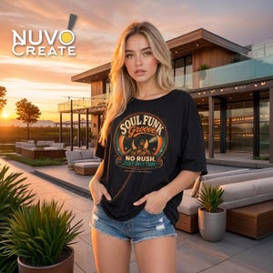 May include: A black t-shirt featuring a circular graphic with the text SOUL FUNK GROOVE NO RUSH. JUST RHYTHM. The design includes a stylized illustration of a person and a vinyl record in shades of orange, teal, and cream, paired with denim shorts.