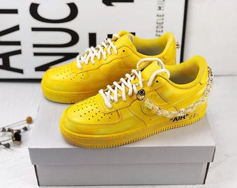 Hand-painted sneakers, custom Air Force 1 sneakers, low-top punk style chain, graffiti.