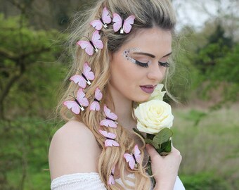 Pale pink butterfly hair clips