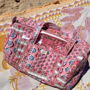 Handcrafted cotton duffle bags made using patchwork