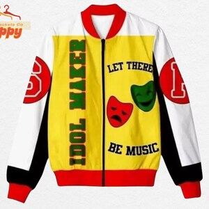 May include: A bomber jacket with a yellow front panel featuring the text "IDOL MAKER" and "LET THERE BE MUSIC". The jacket has white sleeves with red accents and the numbers "5" and "1". The jacket has a red collar, cuffs, and hem.