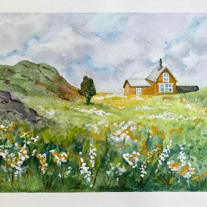 May include: Watercolor painting of a small orange house with a white roof and green trim, set against a backdrop of rolling green hills and a field of white wildflowers.