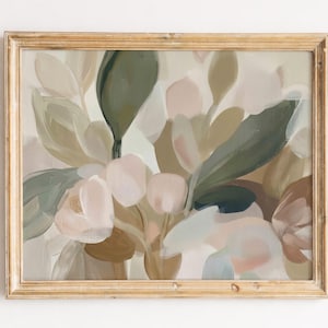 May include: An abstract floral painting in a gold-toned wooden frame. The artwork features soft, muted colours including shades of green, beige, and pink. The brushstrokes create a layered effect, depicting stylized leaves and flowers. The overall aesthetic is calming and natural.