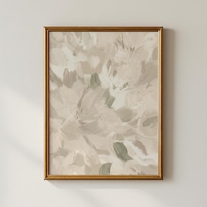 Könnte beinhalten: Abstrakter Kunstdruck in einem goldenen Rahmen. Das Kunstwerk zeigt ein strukturiertes, geschichtetes Design mit Pinselstrichen in Beige-, Creme- und gedämpften Grüntönen. Die Gesamtästhetik ist weich und neutral, passend für verschiedene Einrichtungsstile.