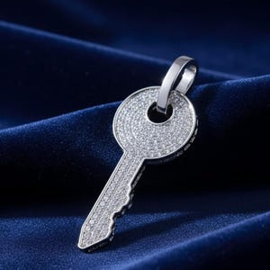 May include: A set of three ceramic mugs with a speckled, matte finish. The mugs are in shades of cream, light gray, and dark gray. Each mug has a simple, minimalist design, perfect for coffee or tea.