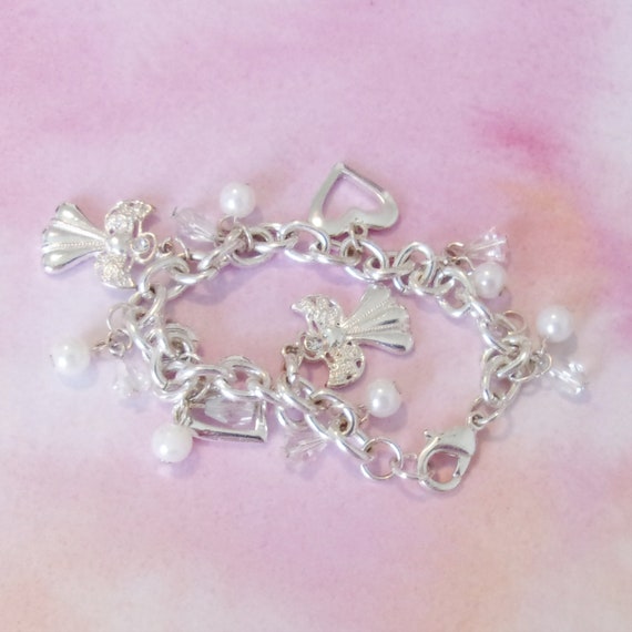 Vintage bracelet silvertone angel charms faux pea… - image 2