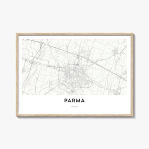 May include: A framed map print of Parma, Italy, in a minimalist style. The map is in grayscale, with the city's layout and surrounding areas detailed. The text "PARMA" and "ITALY" are printed in a clean font below the map.