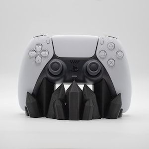 May include: A set of three ceramic mugs with a speckled, matte finish in cream, light grey, and dark grey. Each mug has a simple, minimalist design, ideal for coffee or tea.