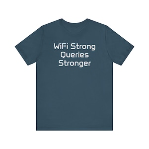 May include: Teal t-shirt with the white text "WiFi Strong Queries Stronger". The short-sleeved shirt is made of a soft material.