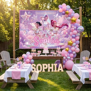May include: A birthday party scene with a banner that reads "Join us to celebrate!" and "Sophia 6th Birthday." The party features a table with a cake, cupcakes, and a balloon arch in pink, purple, and gold. Picnic tables are set up with pink table runners.