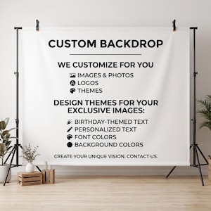 May include: A white fabric backdrop mounted on a black metal stand. The text reads: CUSTOM BACKDROP, WE CUSTOMIZE FOR YOU, IMAGES & PHOTOS, LOGOS, THEMES, DESIGN THEMES FOR YOUR EXCLUSIVE IMAGES: BIRTHDAY-THEMED TEXT, PERSONALIZED TEXT, FONT COLORS, BACKGROUND COLORS, CREATE YOUR UNIQUE VISION. CONTACT US.