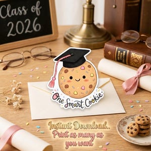 May include: A graduation-themed sticker featuring a smiling cookie wearing a graduation cap and the text "One Smart Cookie." The image includes a small chalkboard with "Class of 2026" and a plate of cookies.