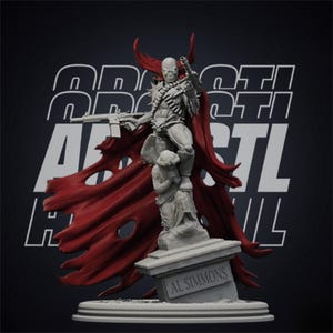 May include: A detailed figurine of Spawn, a comic book character, standing atop a tombstone. The figure is gray with a red cape and is holding a gun. The tombstone reads "AL SIMMONS". The background has the text "ARTI STL".