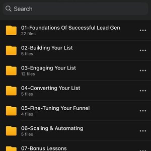 May include: A dark gray screen displays a list of digital folders with titles like "Foundations Of Successful Lead Gen" and "Building Your List." Each folder is represented by a yellow icon. The text "Aj Cassata (Foundr) - Find Your Dream Clients..." is at the top.