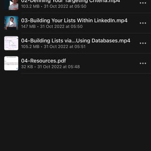 May include: Screenshot of a mobile device screen displaying a list of video and PDF resources. The list includes titles such as "Your List Mindset.mp4" and "Building Lists via... Using Databases.mp4". The interface is dark with white text.