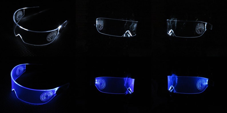 May include: Two pairs of LED light-up glasses, one pair is white and the other pair is blue. The glasses are clear and have a futuristic design.