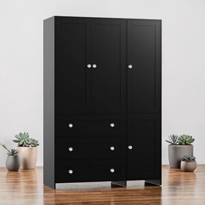 May include: A tall, black storage cabinet with multiple doors and drawers. The cabinet has silver-colored knobs and is set against a white wall. The cabinet is made of wood and has a modern design.