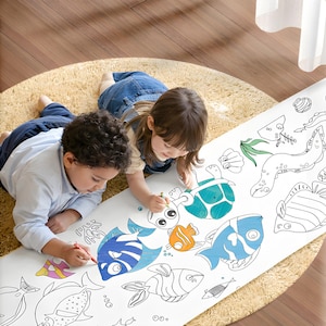 May include: Two children coloring a large, white paper roll featuring black line drawings of sea creatures. The paper is on a beige rug. The children are using crayons to color the fish, turtles, and other sea life.