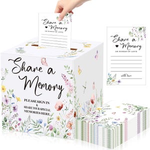 May include: A white square memory box featuring floral illustrations and the text Share a Memory, Please Sign In & Share Your Special Memories Here. Includes a stack of matching cards with the text Share a Memory or Words of Love.