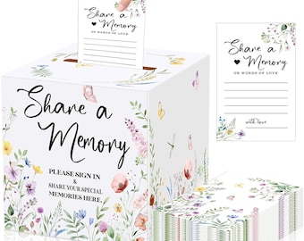 Puede incluir: Una caja de recuerdos cuadrada blanca con ilustraciones florales y el texto Share a Memory, Please Sign In & Share Your Special Memories Here. Incluye un paquete de tarjetas a juego con el texto Share a Memory or Words of Love.