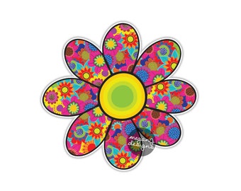 May include: A colorful, multi-layered daisy with a yellow center and pink, red, blue, green, and orange petals. The daisy is outlined in black and has a white background.