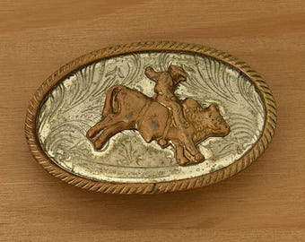 Hebilla de cinturón vaquero vintage de plata alemana, estilo rodeo, country western americano.