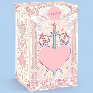 May include: A pastel tarot card box with a pink heart pierced by three swords. The box features the word "TAROT" above angel wings and the words "PASTEL ARCANA" below the heart. The design includes floral and heart motifs in soft pinks and creams.