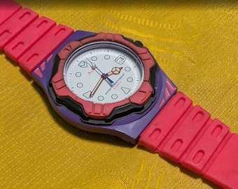 Reloj deportivo unisex Seiko Alba V532-6F50 vintage, color rosa y morado, 38 mm, fecha, batería nueva en funcionamiento.