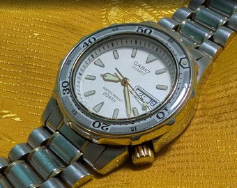 Casio MD-715 Marlin Vintage Diver Watch 200M WR Steel Bracelet Day Date Quartz Japan. case 35mm.NEW Battery