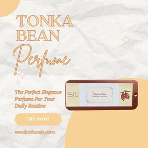 May include: An advertisement for Tonka Bean perfume. The text reads "TONKA BEAN Perfume" in a stylish font. A small rectangular container of solid perfume is displayed, with the text "Tonka Bean 1oz Solid Perfume". The ad also includes the text "The Perfect Elegance Perfume For Your Daily Routine".
