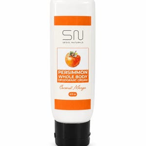 May include: A white squeeze tube of Seoul Naturals Persimmon Whole Body Deodorant Cream with a black cap. The label features an orange persimmon illustration, the text SN Seoul Naturals, Persimmon Whole Body Deodorant Cream, Coconut Mango, and 4 fl oz.